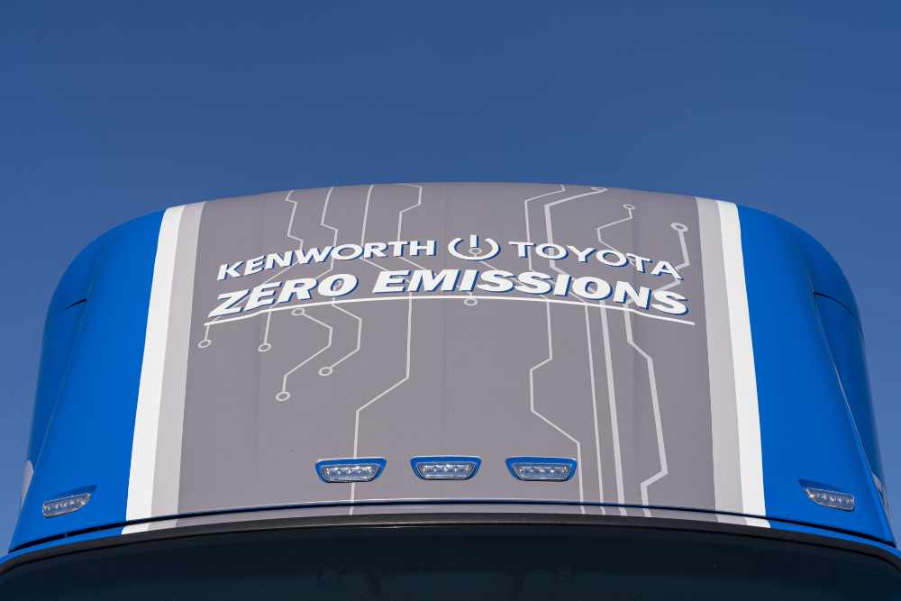 Truck air dam with Kenworth, Toyota and Zero Emissions
